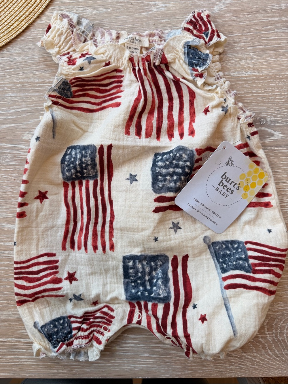 Burt's Bees Baby Cream Romper with Red and Blue Flag Print
